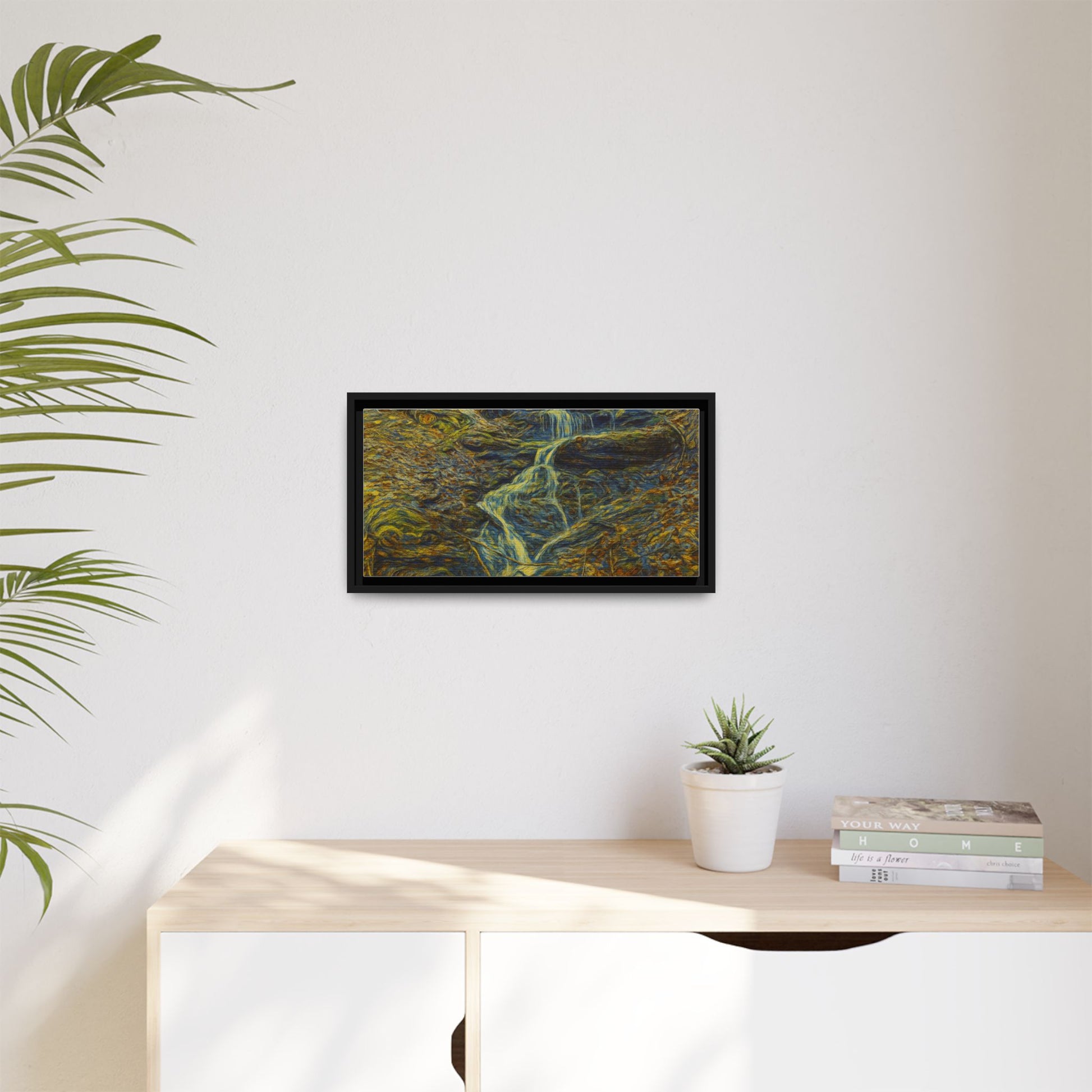 Framed matte canvas wall art of an autumn forest with a waterfall, showcasing vibrant fall colors and natural scenery.