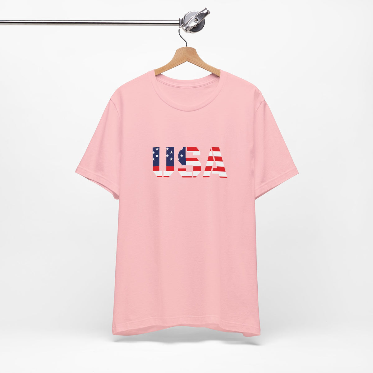 USA flag text T-shirt by Printify featuring patriotic Fourth of July design, with a front view of the casual graphic tee.