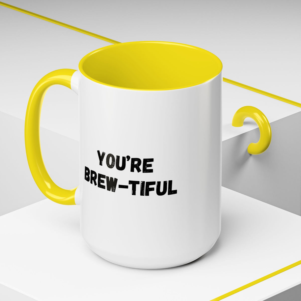 You’re Brew-tiful Coffee Mug – Cute Coffee Pun Accent Mug (11/15oz) — white ceramic accent mug with glossy finish and bold black “YOU’RE BREW-TIFUL” print, angled view