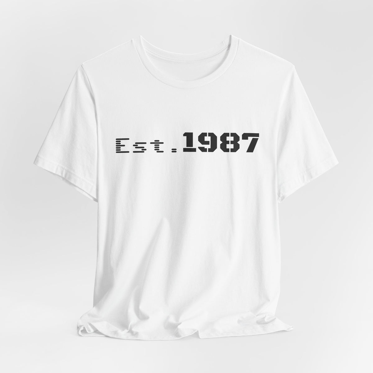 Vintage Est. 1987 T-Shirt by Printify featuring a classic design celebrating the year 1987 in a casual style.