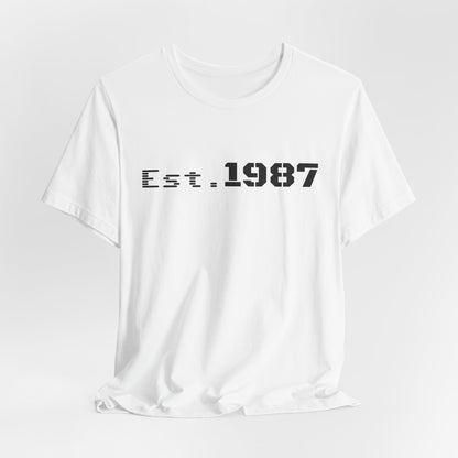 Vintage Est. 1987 T-Shirt by Printify featuring a classic design celebrating the year 1987 in a casual style.