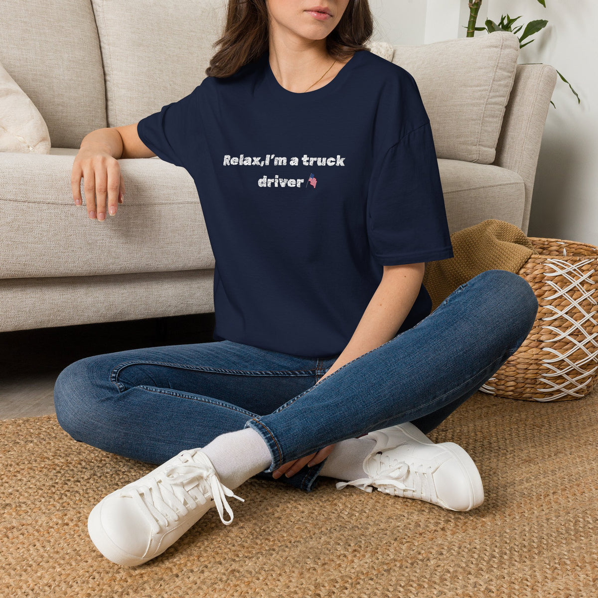 Pink heart graphic on a white Relax, I'm a Truck Driver T-Shirt featuring a humorous trucker slogan, casual and comfortable fit.