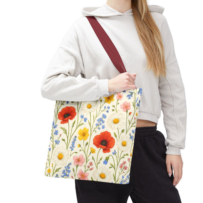 Wildflower Poppy print tote bag by Printify featuring a vibrant floral all-over pattern, made of durable fabric for everyday use.