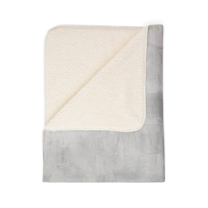 Soft Sherpa fleece throw blanket by Printify, cozy winter home decor perfect for relaxing on the sofa or bed.