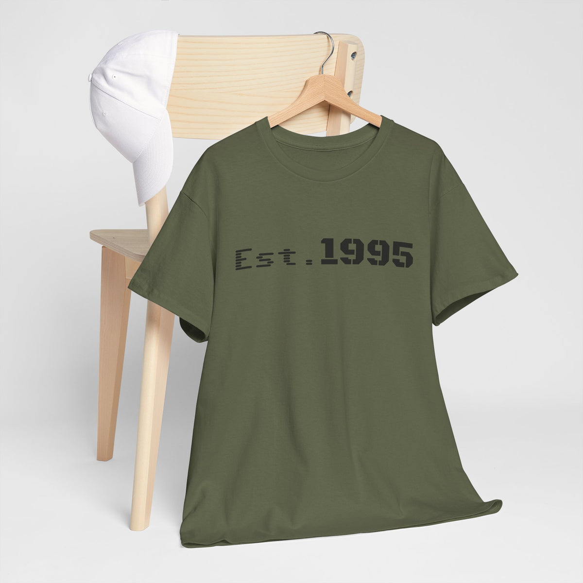 Vintage minimalist "Est. 1995" birthday T-shirt by Printify featuring clean design and classic style.