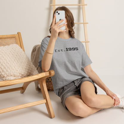 Vintage minimalist T-shirt with "Est. 1995" print, celebrating a birthday, made by Printify.