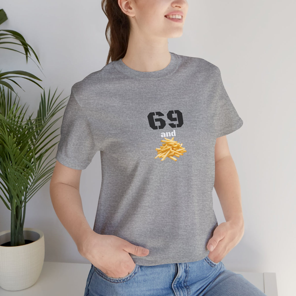 Unisex graphic T-shirt with a humorous 69 and French fries print, in a quirky design by Printify.