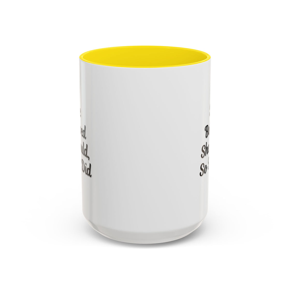 White ceramic motivational coffee mug with black text reading "She Believed She Could, So She Did" in a stylish font.