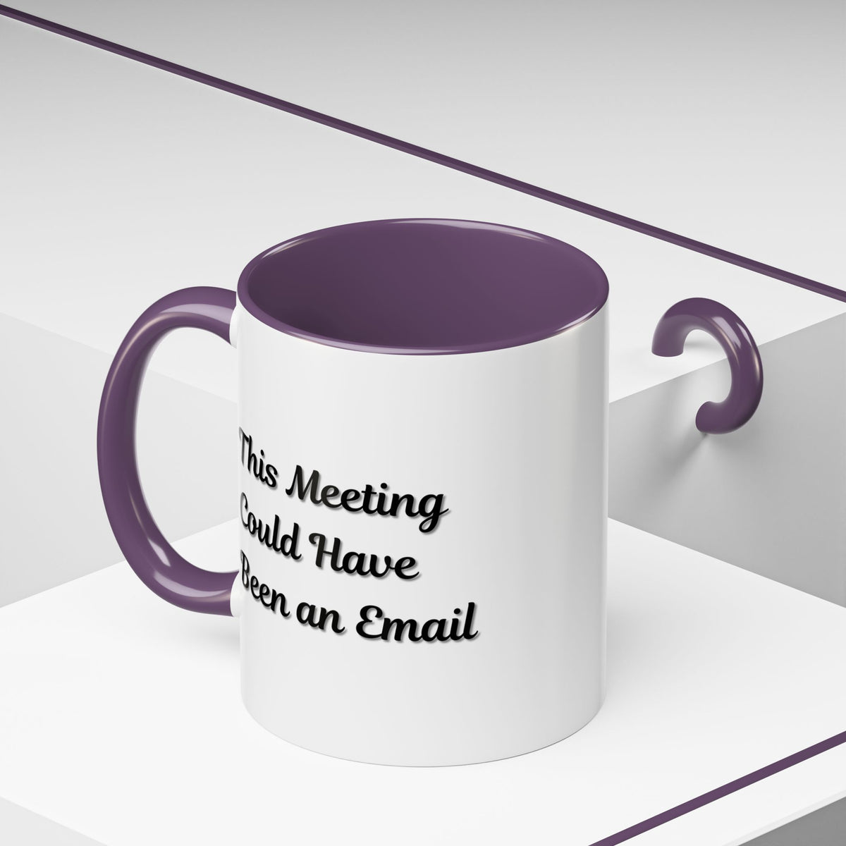 Funny office coffee mug with the phrase "This Meeting Could Have Been An Email" printed on a ceramic mug for office humor.