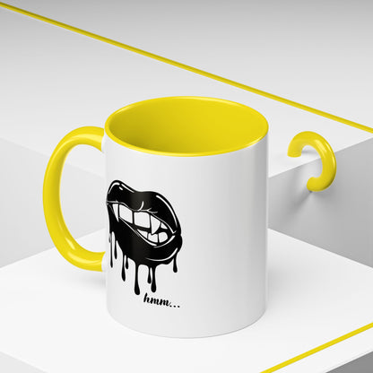 Black ceramic coffee mug featuring a dripping lips graphic in bite design, available in 11oz or 15oz sizes.