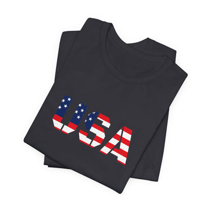 USA flag text T-shirt by Printify featuring patriotic design, perfect for Fourth of July celebrations and casual wear.