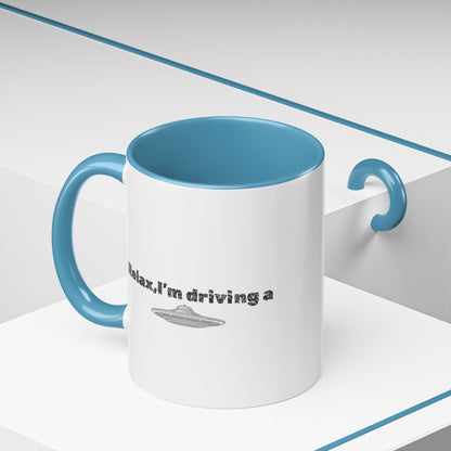 Ceramic coffee mug with "Relax, I’m Driving" and UFO accent design in 11 oz size, by Printify.