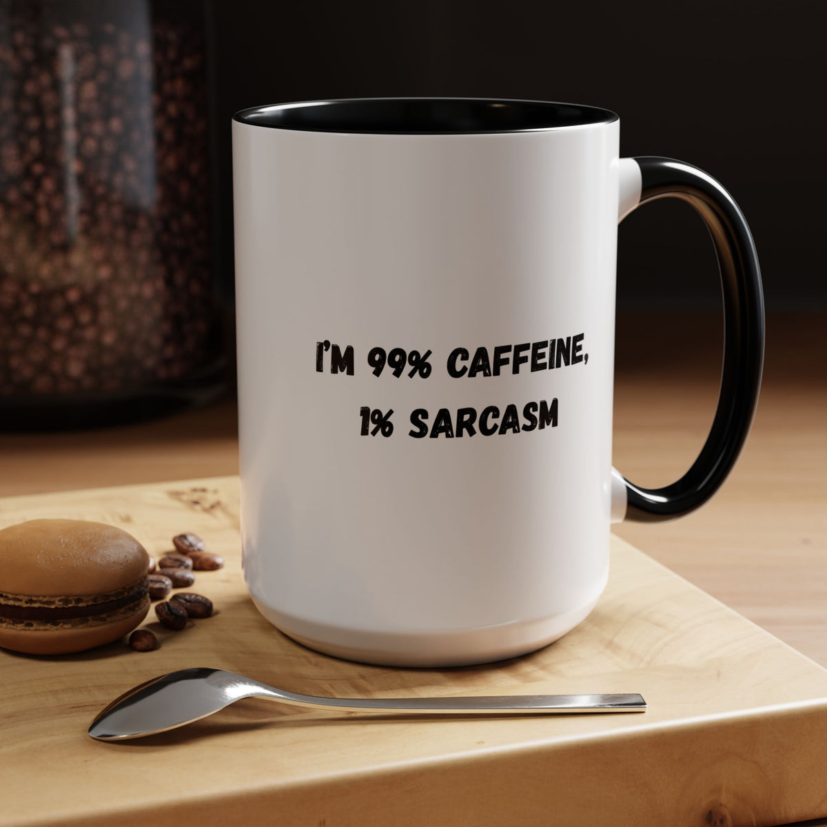 Ceramic coffee mug with "I'm 99% Caffeine, 1% Sarcasm" printed in black text, featuring a white background and a handle.