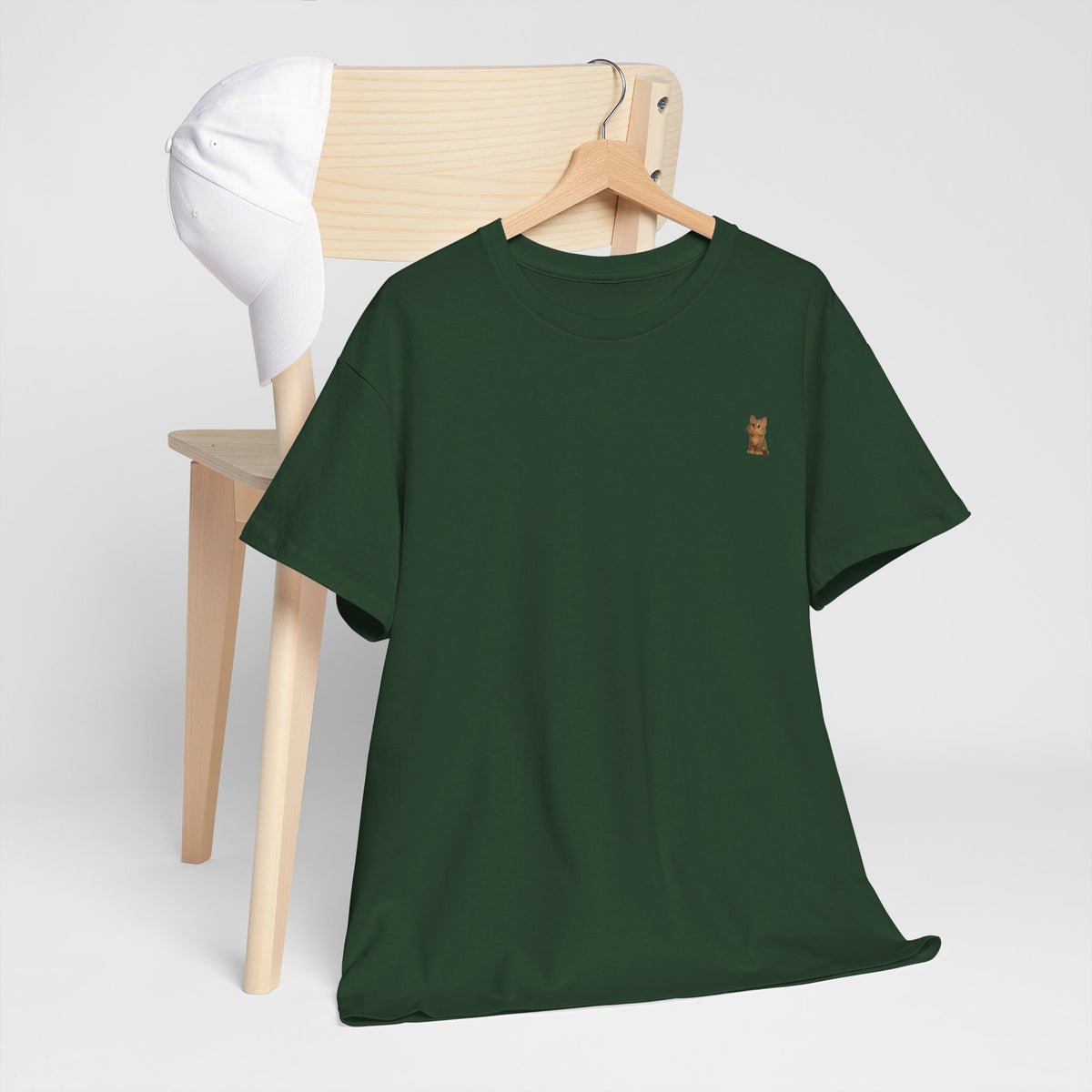 Brown kitten graphic on a cat lover T-shirt, featuring a cute and playful design by Printify.