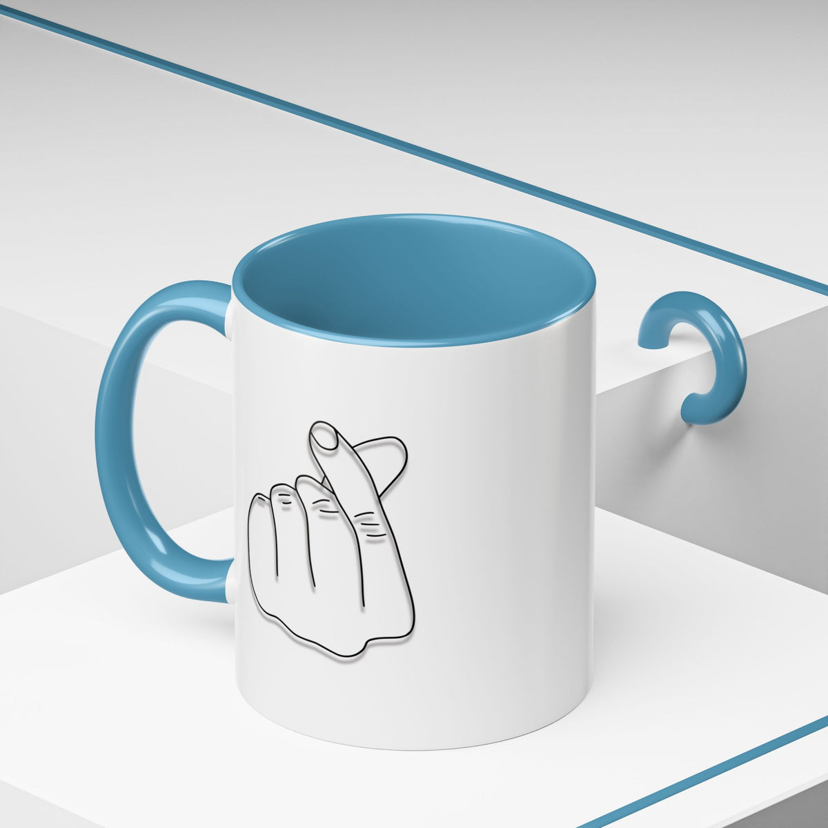Minimal Korean finger heart accent mug by Printify, 11oz or 15oz ceramic coffee mug with simple design and love-themed detail.
