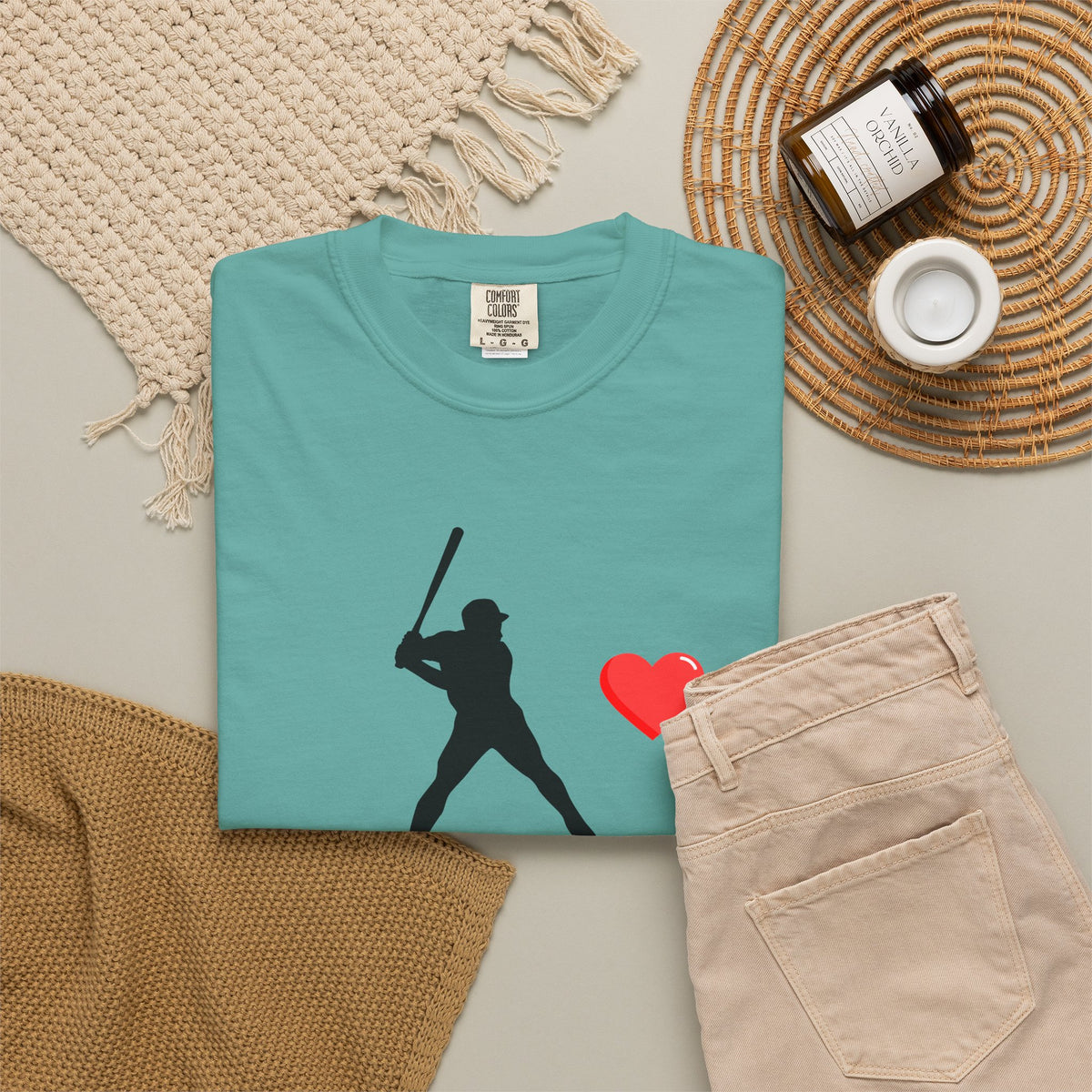 White baseball batter heart T-shirt by Printify featuring a graphic of a batter swinging a bat on the front.