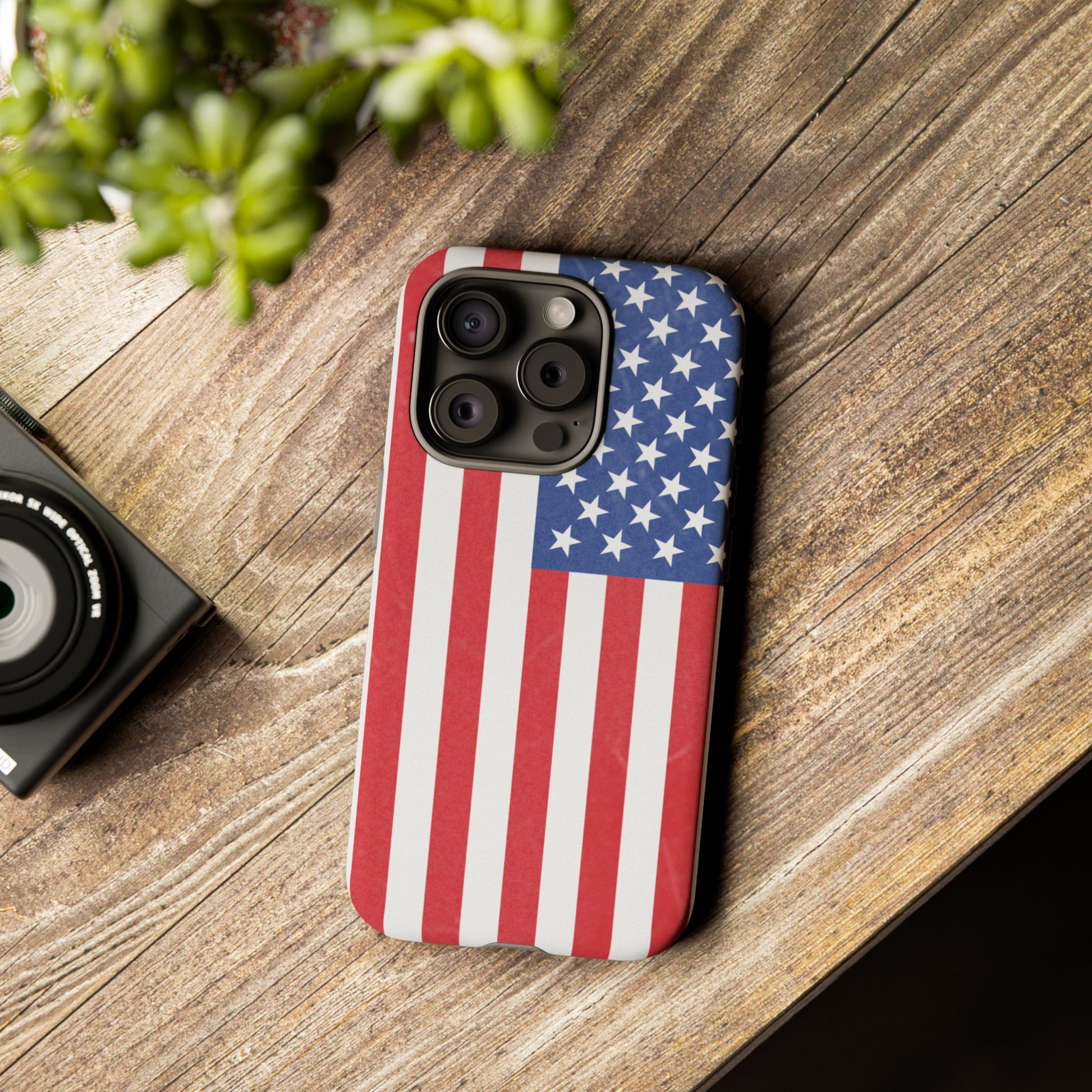 Durable American flag phone case for iPhone with patriotic design, made by Printify, offering strong protection and vibrant colors.