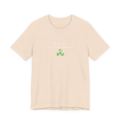 Eco humor T-shirt by Printify featuring the phrase "I’m Not Lazy, I’m an Energy-Saving Mock" on a casual cotton tee.
