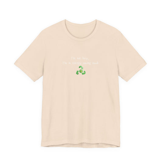 Eco humor T-shirt by Printify featuring the phrase "I’m Not Lazy, I’m an Energy-Saving Mock" on a casual cotton tee.